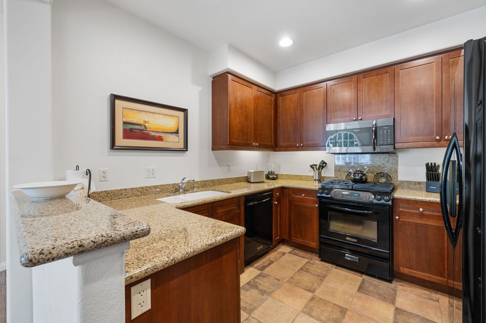 Condo, 1 Bedroom | Private kitchen | Coffee/tea maker, fridge, oven, stovetop