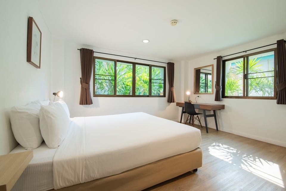 Premium Two-bedrooms Deluxe Garden View | Minibar, in-room safe, individually decorated, individually furnished