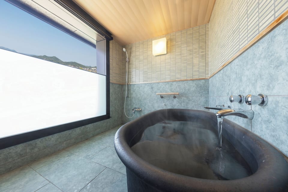 Corner suite-Sansoka with open-air bath (Non-smoking) | Bathroom | Combined shower/tub, deep soaking tub, rainfall showerhead