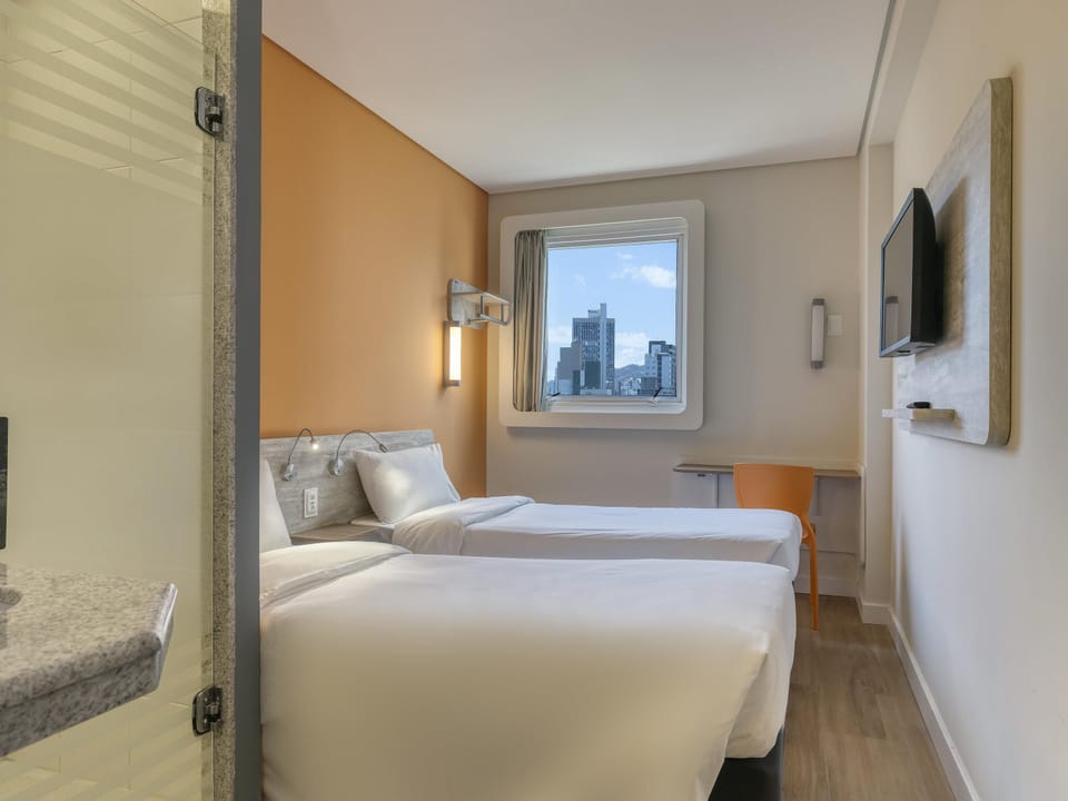 Standard Room, 2 Twin Beds | 1 bedroom, desk, laptop workspace, blackout drapes
