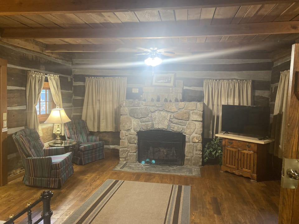 Cabin | Living area | 42-inch Smart TV with cable channels, TV, fireplace