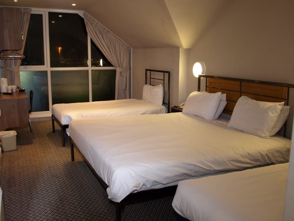 Quadruple Room | Desk, iron/ironing board, free WiFi, bed sheets