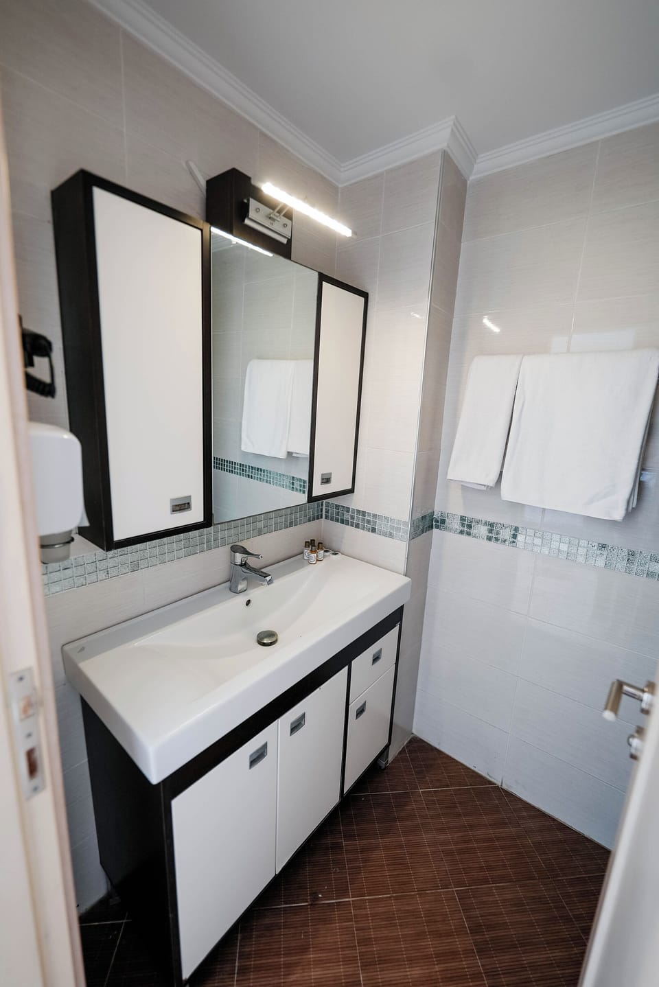 Shower, free toiletries, hair dryer, slippers