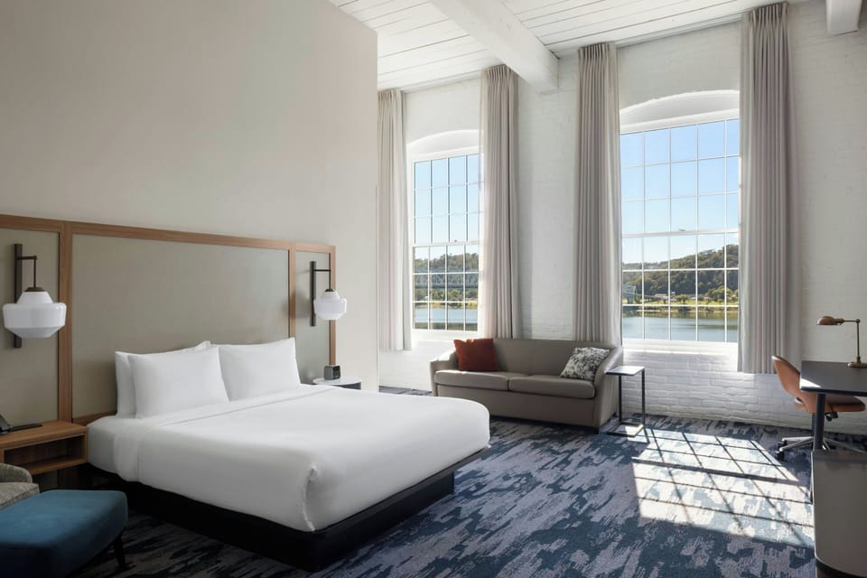 Down comforters, desk, laptop workspace, blackout drapes