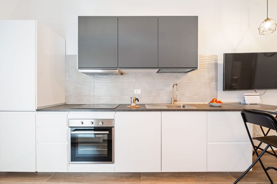 Apartment, 1 Bedroom | Private kitchen | Full-size fridge, oven, stovetop, dishwasher