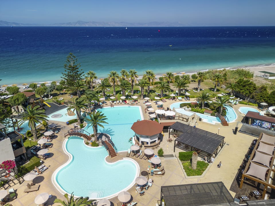 Indoor pool, outdoor pool, pool umbrellas, sun loungers