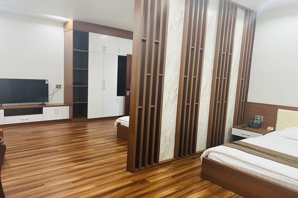Deluxe Triple Room | Minibar, desk, iron/ironing board, free WiFi