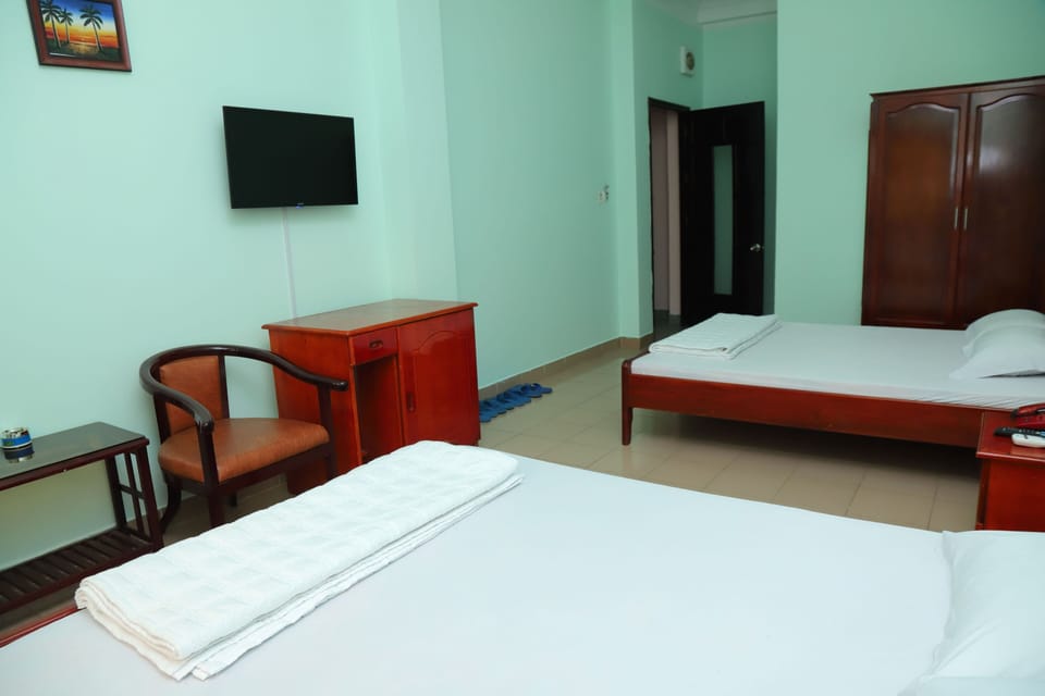 Standard Triple Room | Minibar, WiFi (free), bed sheets