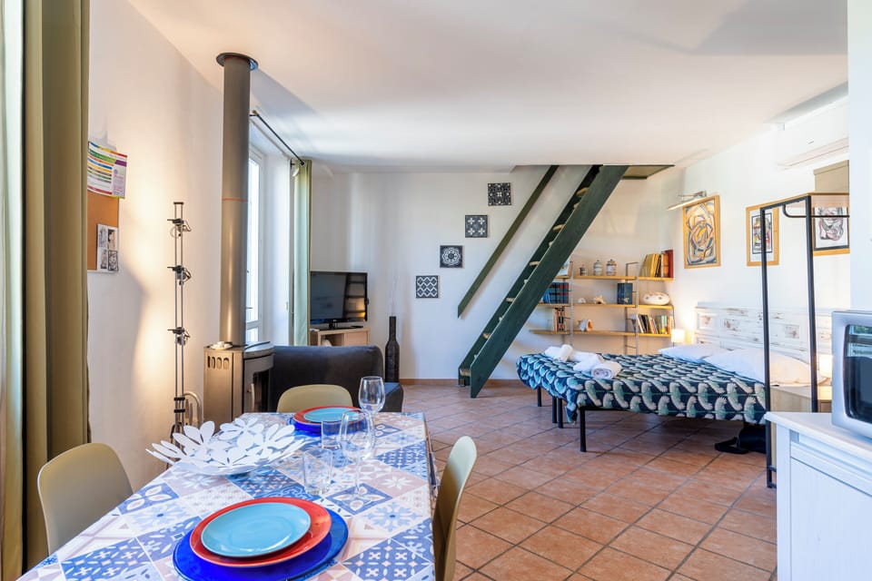 Studio, 1 Bedroom | Living area | Flat-screen TV