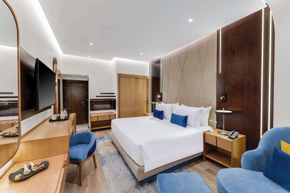 Select Comfort beds, minibar, in-room safe, desk
