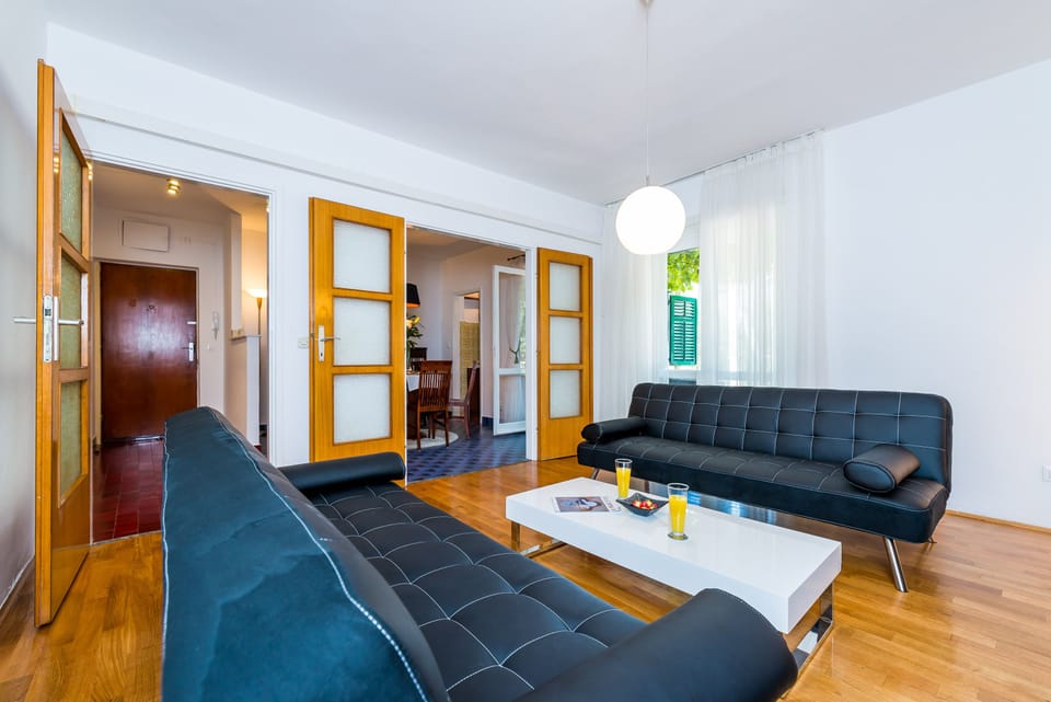 Apartment (Two Bedroom Apartment) | Living room | Flat-screen TV