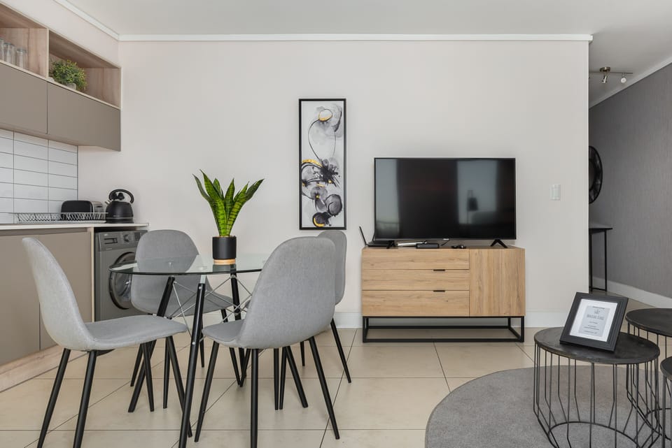 Grand Apartment | Living area | Flat-screen TV