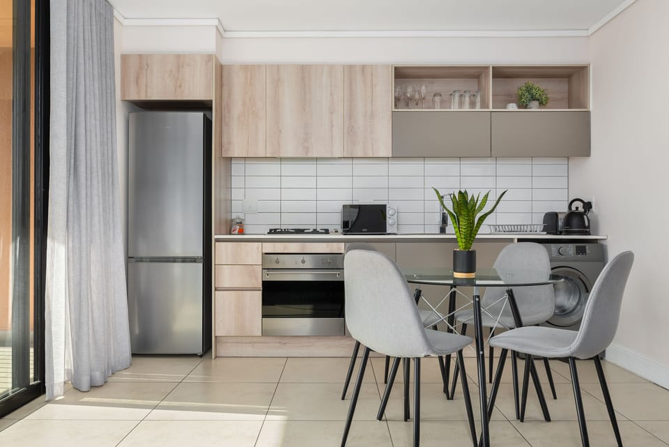 Grand Apartment | Private kitchen | Full-size fridge, oven, stovetop, electric kettle