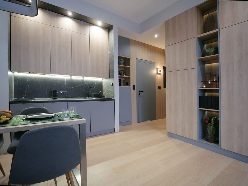 Comfort Apartment, Non Smoking, City View | Living area | 55-inch LED TV with satellite channels, TV, smart speakers