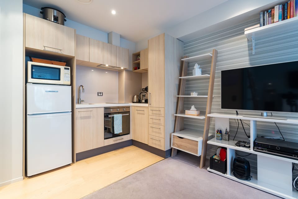 Apartment | Private kitchen | Full-size fridge, microwave, oven, stovetop