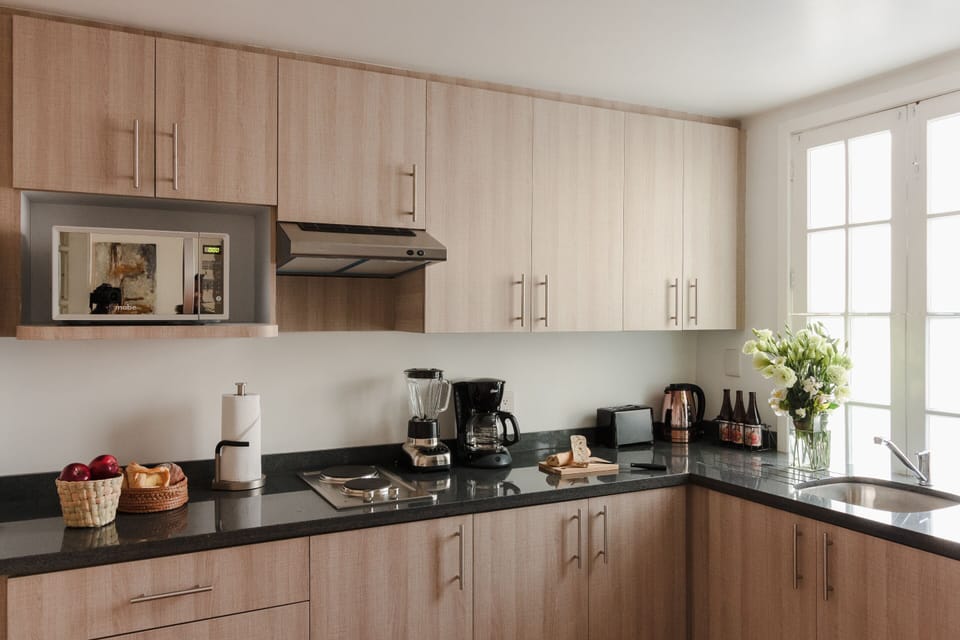 Signature Apartment | Private kitchen | Fridge, microwave, stovetop, coffee/tea maker
