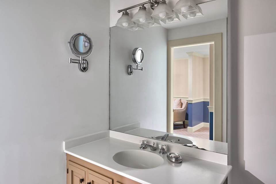 Shower, designer toiletries, hair dryer, bathrobes