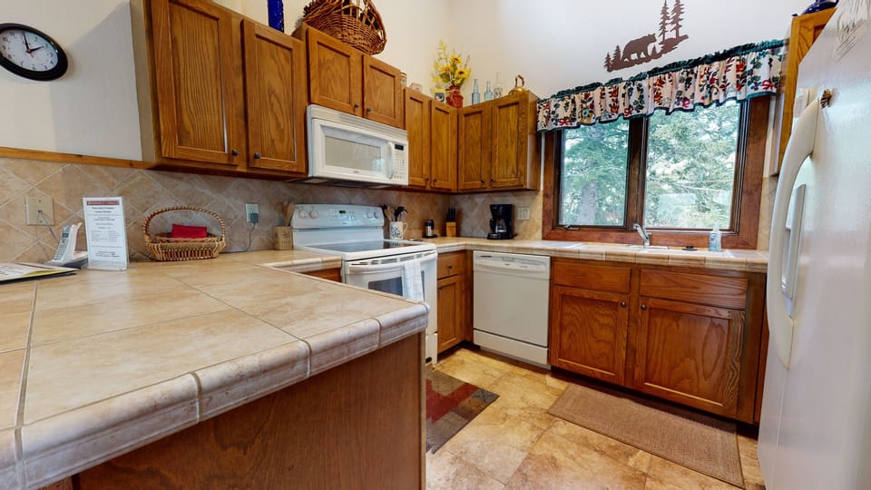 Condo, 2 Bedrooms | Private kitchen | Coffee/tea maker, fridge, oven, toaster