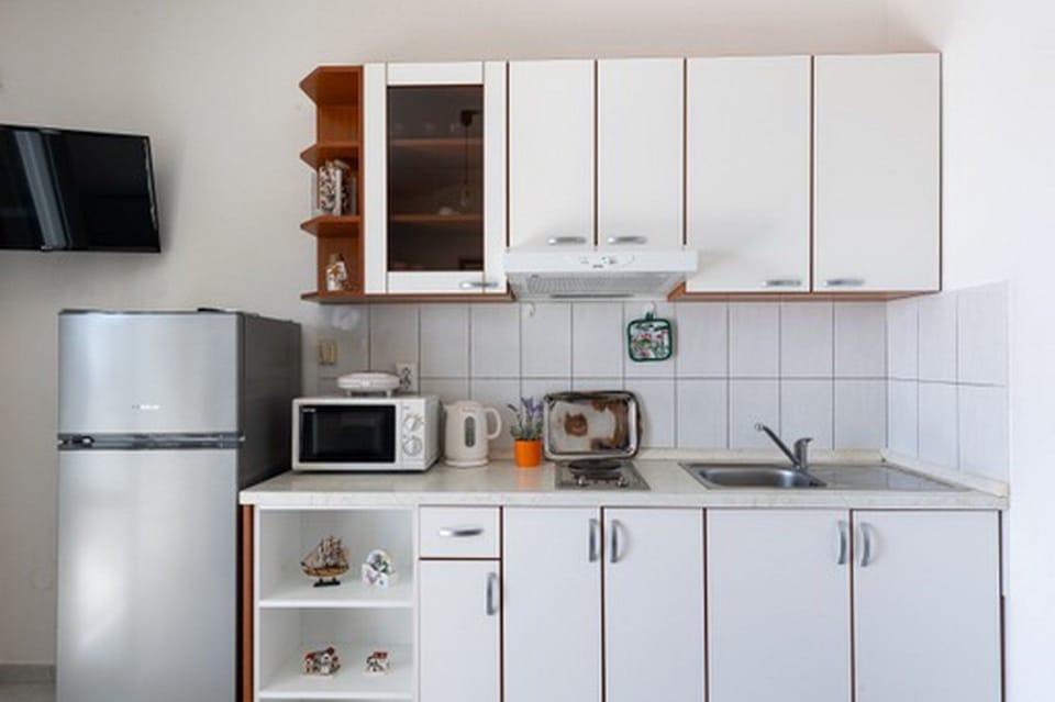 Apartment (One Bedroom Apartment with Terrace an) | Private kitchen | Fridge