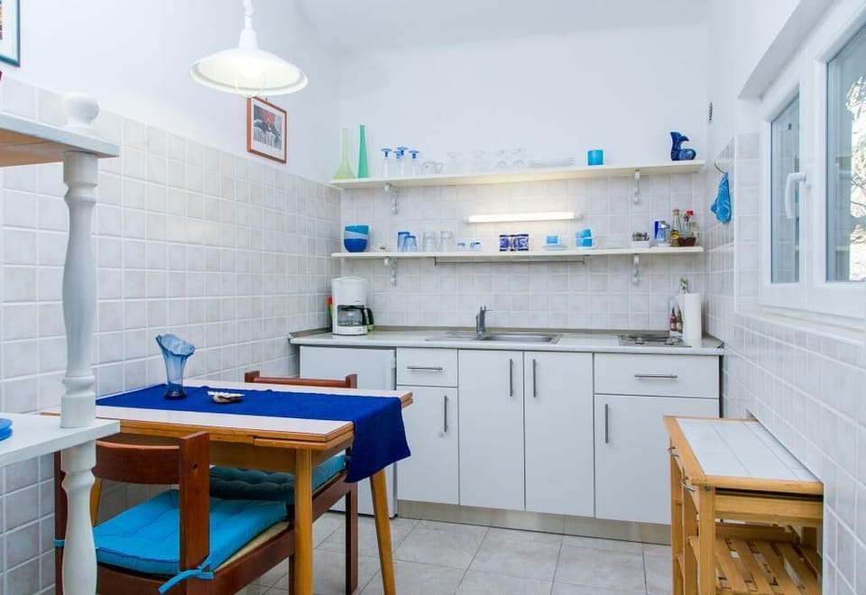 Apartment (One Bedroom Apartment with Two Terrac) | Private kitchen | Fridge, microwave, stovetop, coffee/tea maker