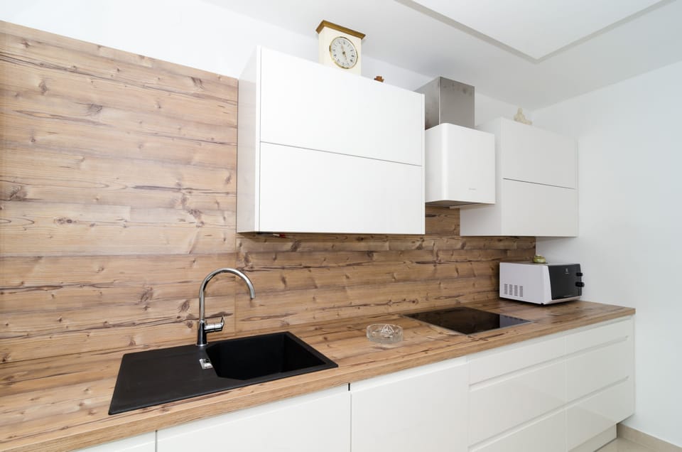 Apartment (Two-Bedroom Apartment) | Private kitchen | Fridge