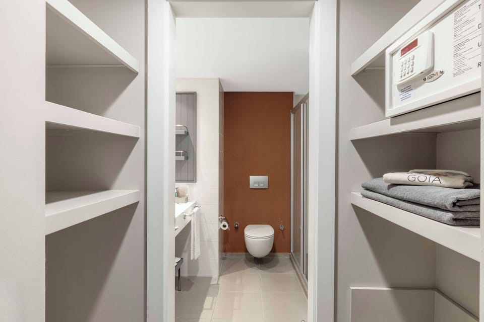 Shower, rainfall showerhead, eco-friendly toiletries, hair dryer