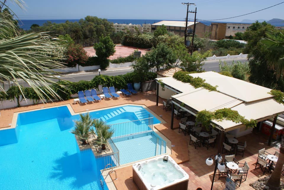 2 outdoor pools, pool umbrellas, sun loungers