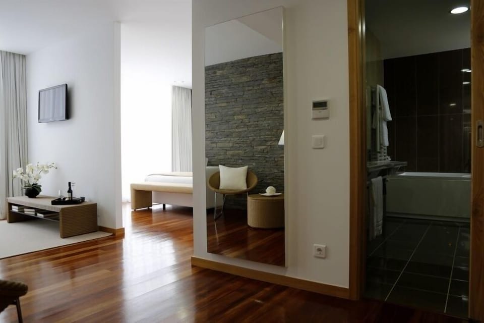 Suite, 1 Double Bed with Sofa bed, Pool View | Living room | 32-inch LCD TV with satellite channels, TV