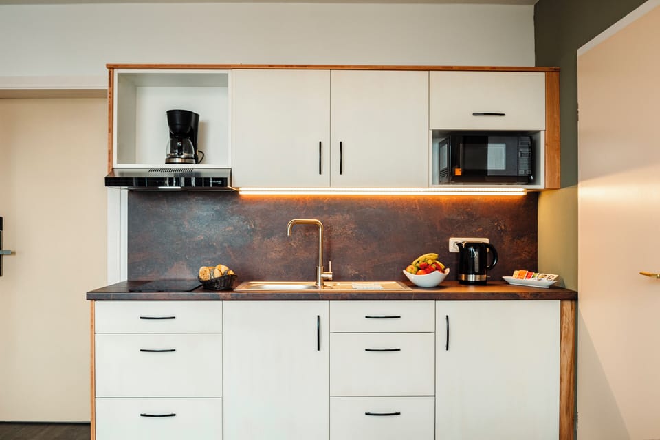 Condo, 1 Bedroom | Minibar, in-room safe, desk, blackout drapes