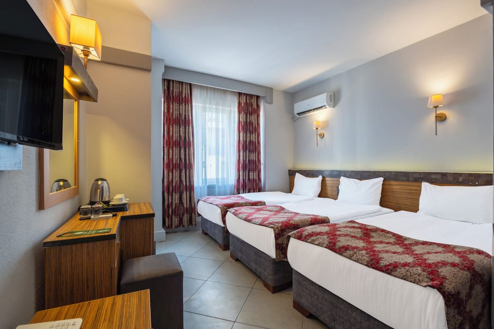 Standard Double or Twin Room | Minibar, in-room safe, free WiFi, bed sheets