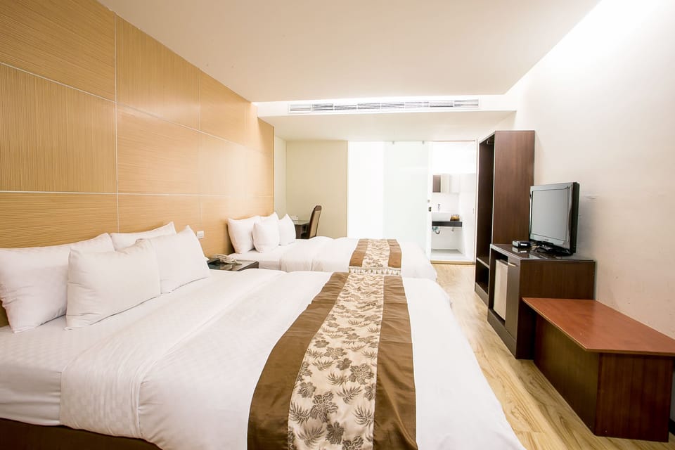 Family Room, No Windows | Down comforters, minibar, in-room safe, desk