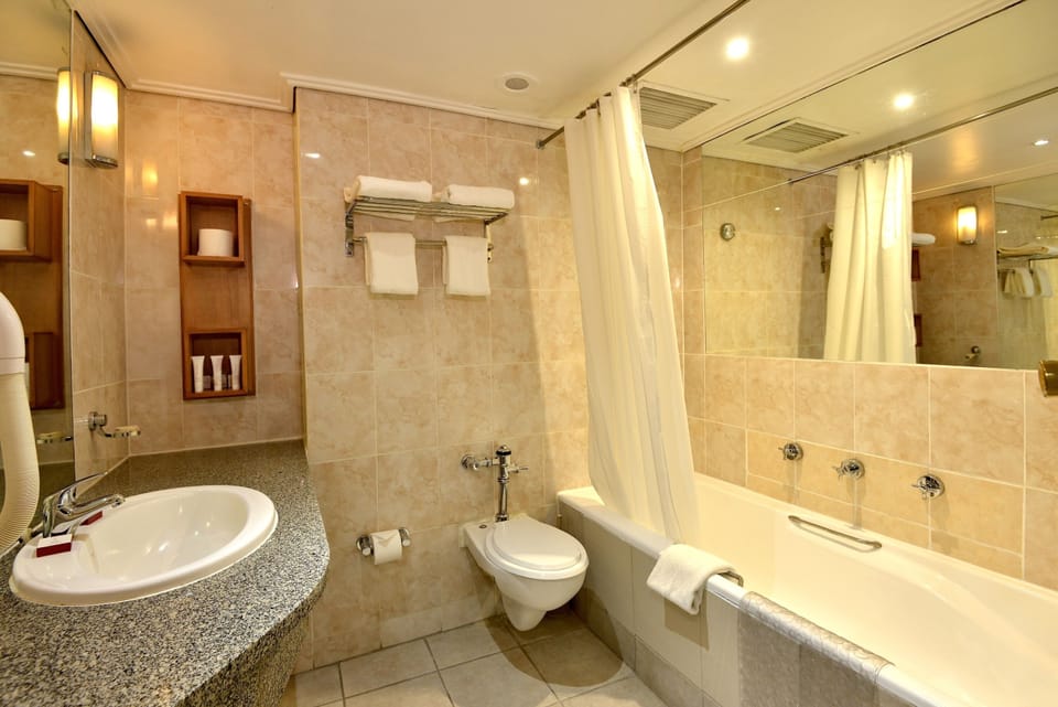Deep soaking tub, free toiletries, hair dryer, towels