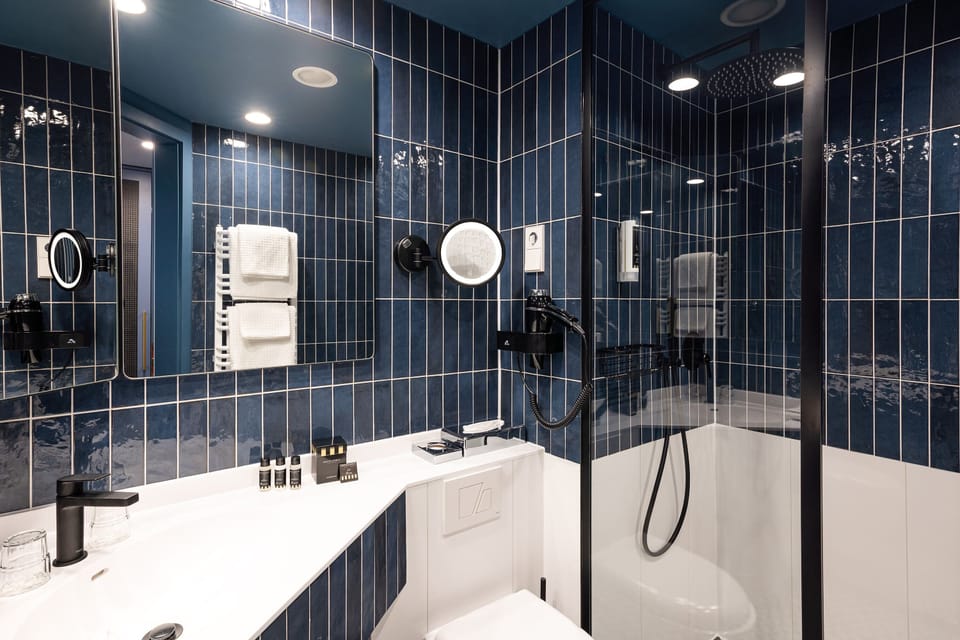 Shower, hair dryer, bathrobes, towels