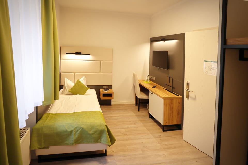 Basic Room | In-room safe, desk, blackout drapes, iron/ironing board (on request)