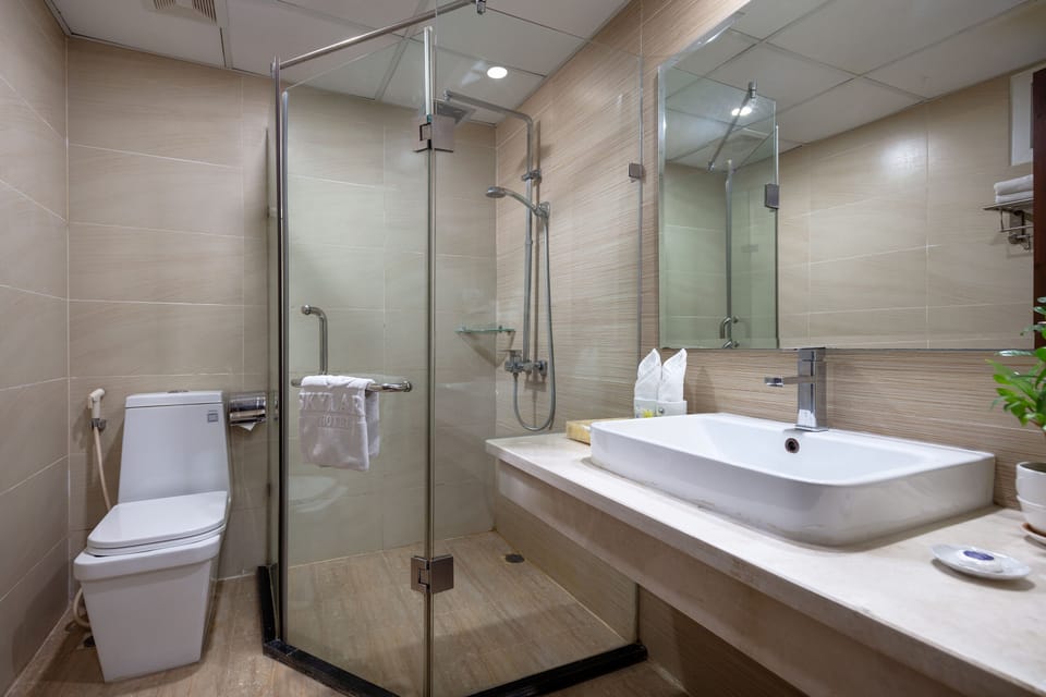 Rainfall showerhead, free toiletries, hair dryer, slippers