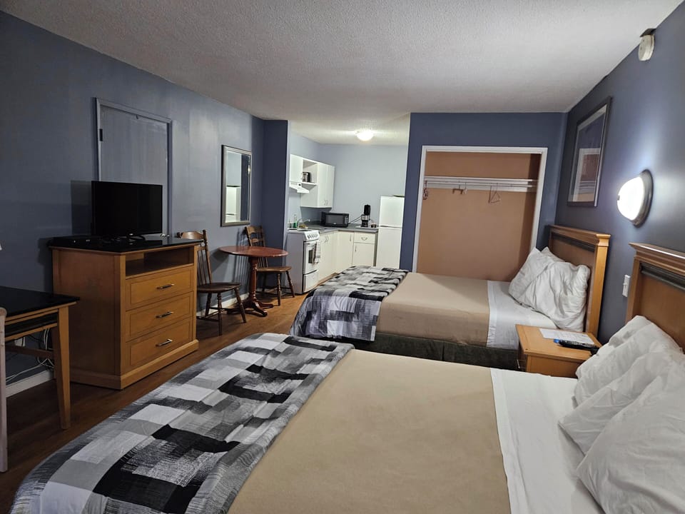 Superior Room, 2 Queen Beds | Desk, free WiFi, bed sheets