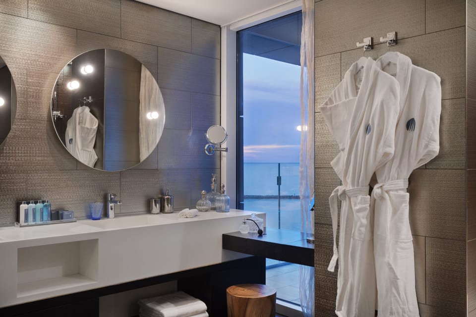 Sea One Suite | Bathroom | Free toiletries, hair dryer, bathrobes, slippers
