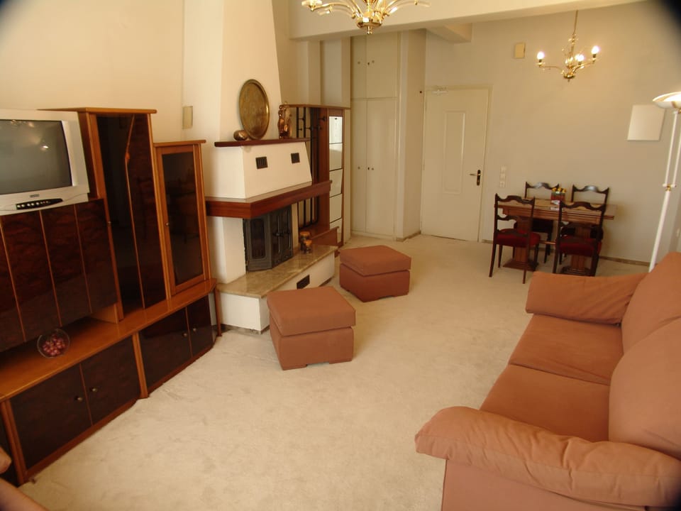 Family Room, Balcony, Sea View | Living room | LCD TV