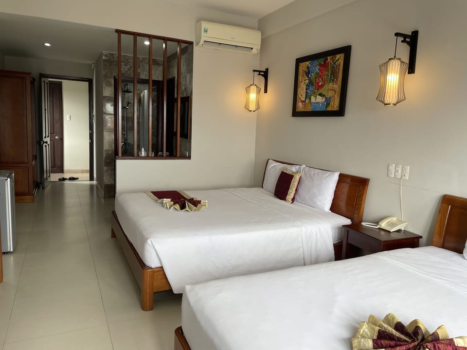Deluxe Triple Room, Balcony | Egyptian cotton sheets, premium bedding, memory foam beds