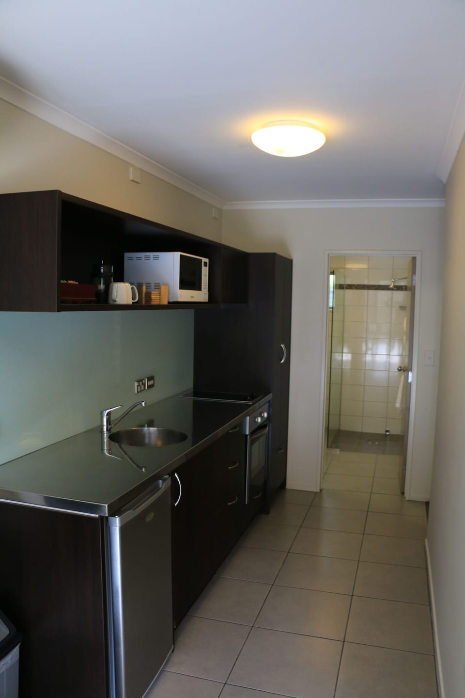 Suite, 2 Bedrooms (Ground Floor) | Private kitchenette | Fridge, microwave, coffee/tea maker, electric kettle