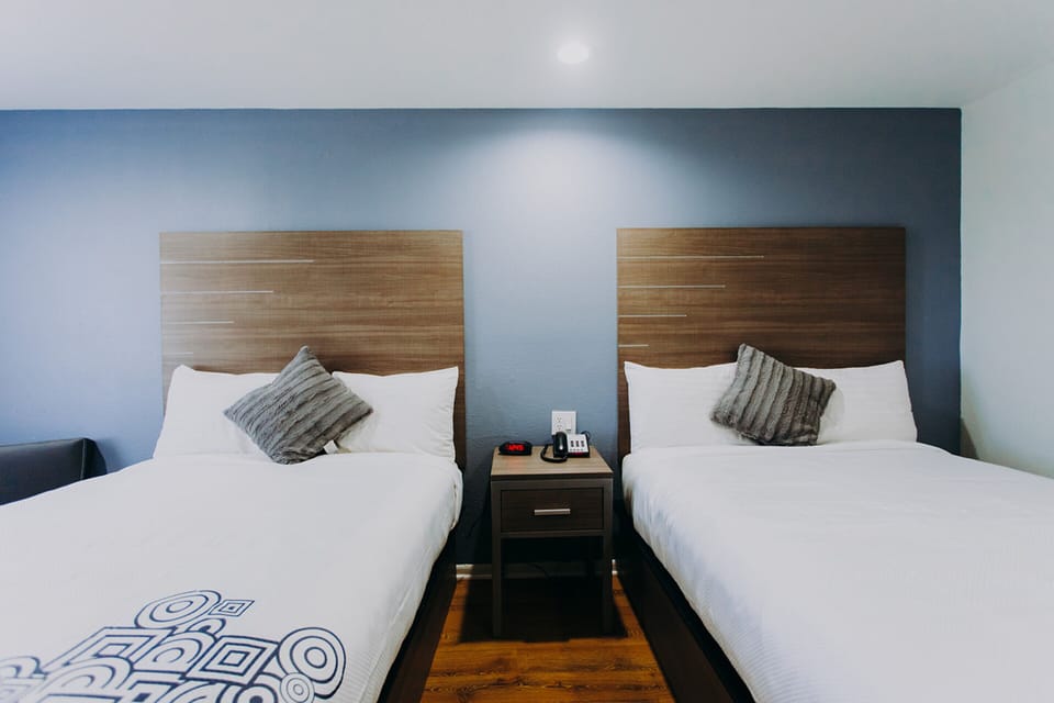 Room, 2 Queen Beds, Non Smoking | Premium bedding, desk, iron/ironing board, free WiFi