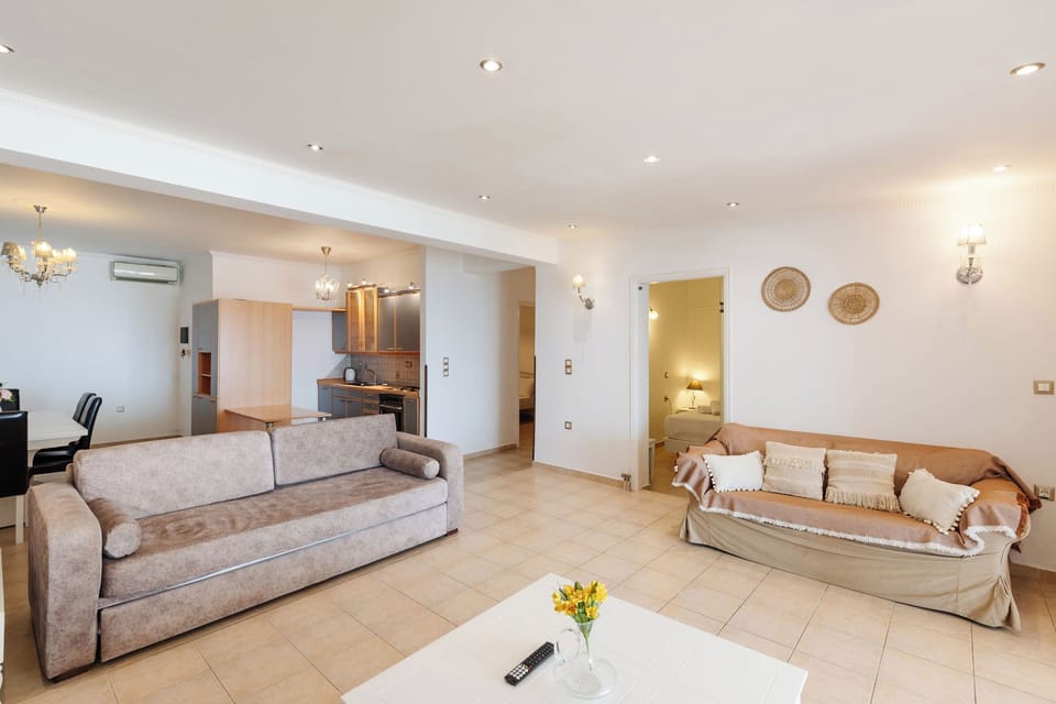Superior Suite with private terrace and Pontikonisi island view | Minibar, in-room safe, blackout drapes, soundproofing