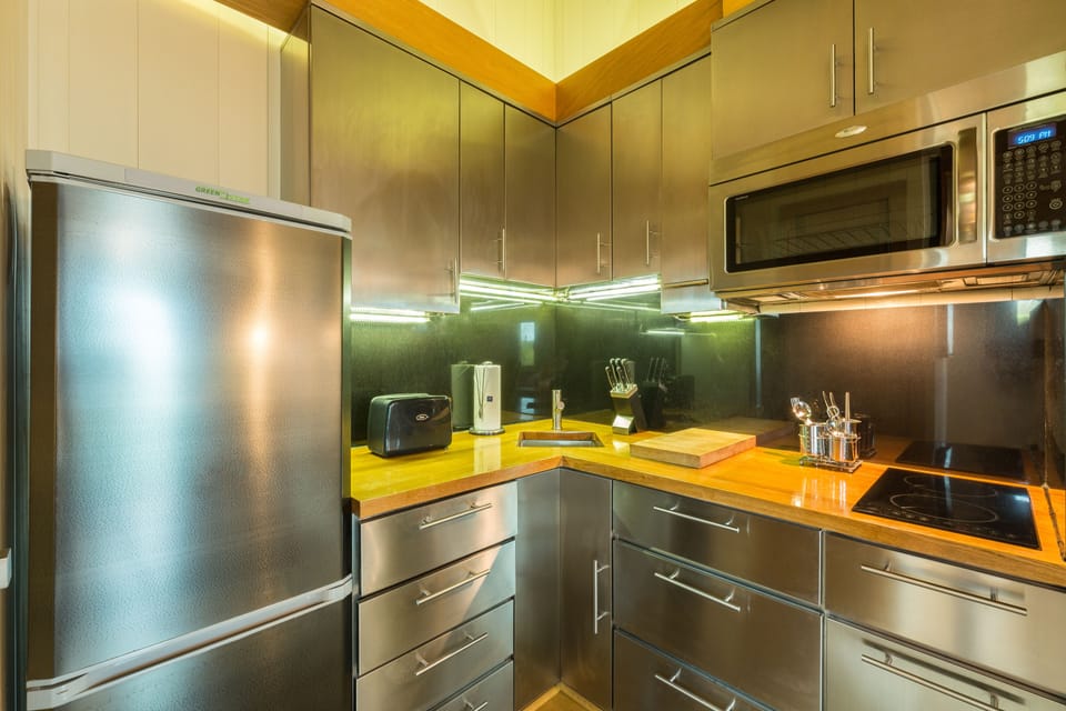 Suite, 1 Bedroom | Private kitchen | Coffee/tea maker, full-size fridge, microwave, stovetop