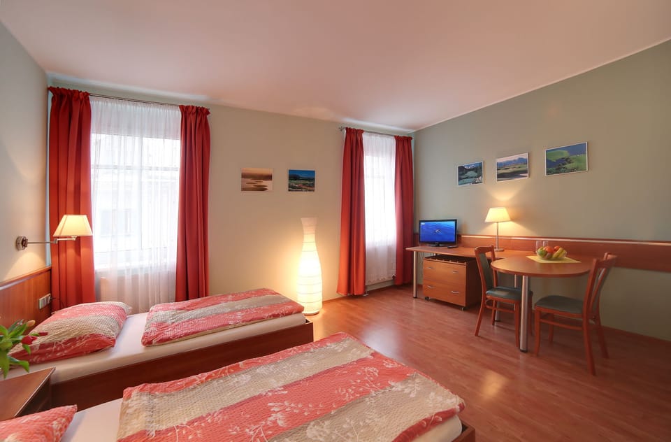 Twin Room | Desk, blackout drapes, soundproofing, iron/ironing board