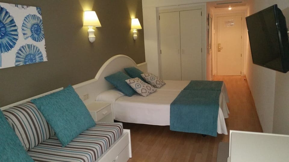 Desk, blackout drapes, iron/ironing board, bed sheets
