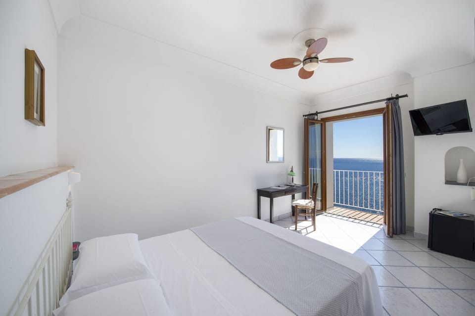 Standard Double Room, Sea View | Individually decorated, individually furnished, desk, blackout drapes