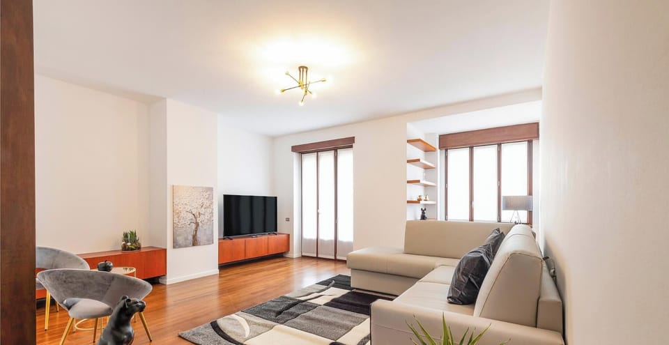 Suite Clotilde ( P.le Principessa Clotilde 6 ) | Living area | 40-inch LCD TV with satellite channels, TV