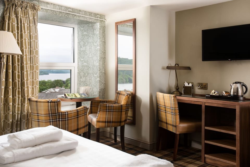 Double Room with Lake View, Annex Building | Individually decorated, individually furnished, desk, iron/ironing board