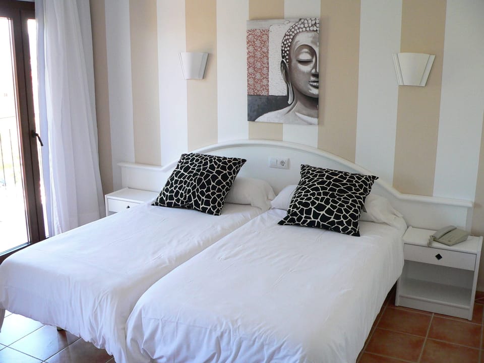 Desk, WiFi (free), bed sheets
