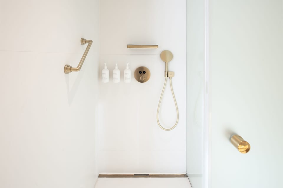 Shower, free toiletries, hair dryer, bathrobes